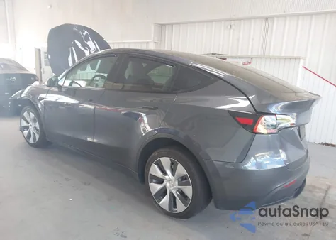 2023 Tesla Model Y Awd/Long Range Dual Motor All-Wheel Drive z USA, uszkodzony, nr VIN 7SAYGDEE4PF799452